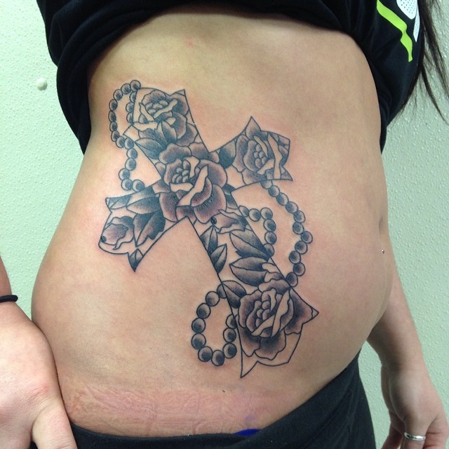 Belly side stomach tattoo for females cross with rose beauty