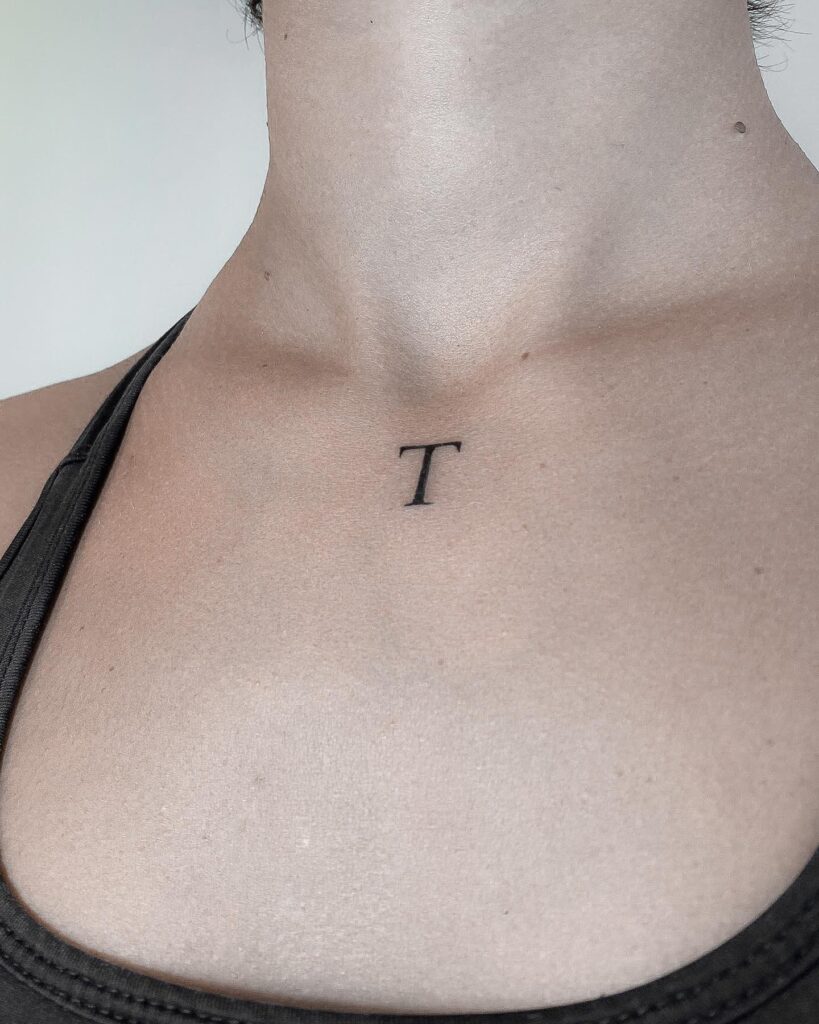 Below the Neck Letter 'T' Tattoo: Voice of Expression, Adding Meaning to the Throat Area