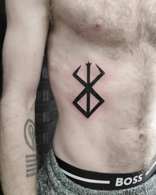 Berserk Rib Tattoo