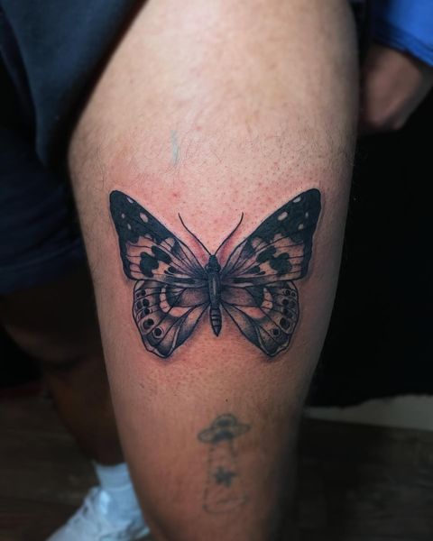 Big Dark Shaded Butterfly Tattoos on the Thigh