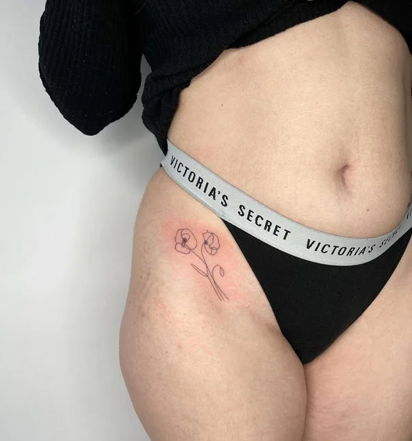 Bikini line tattoo 12