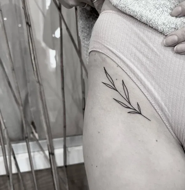 Bikini line tattoo 13