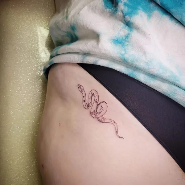 Bikini line tattoo 17