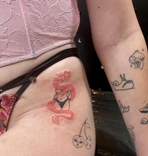 Bikini line tattoo 21