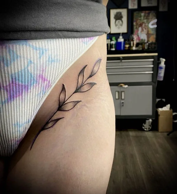 Bikini line tattoo 22