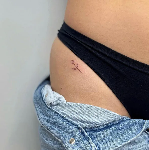 Bikini line tattoo 23