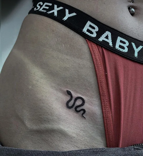 Bikini line tattoo 38