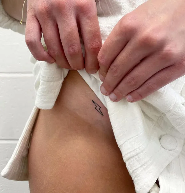 Bikini line tiny tattoo
