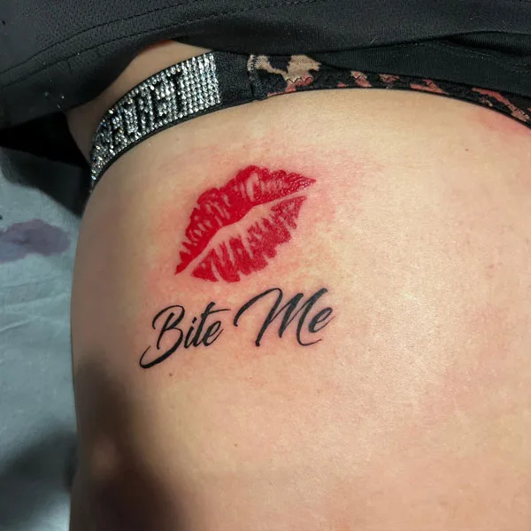 Bite me butt tattoo