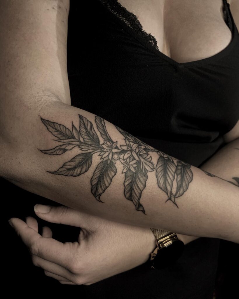 Black & Grey Traditional Botanical Tattoo on Hand Timeless Design