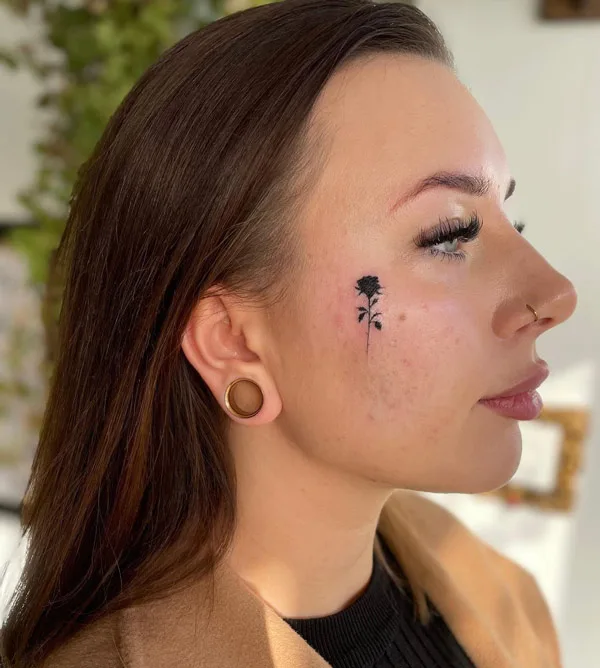 Black Rose Face Tattoo