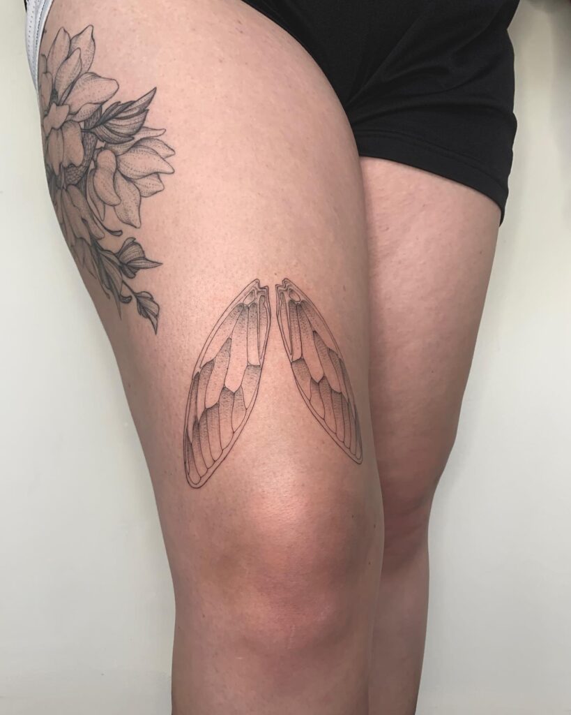 Black and Grey Cicada Wings Tattoo Above the Knee: Cicada Elegance