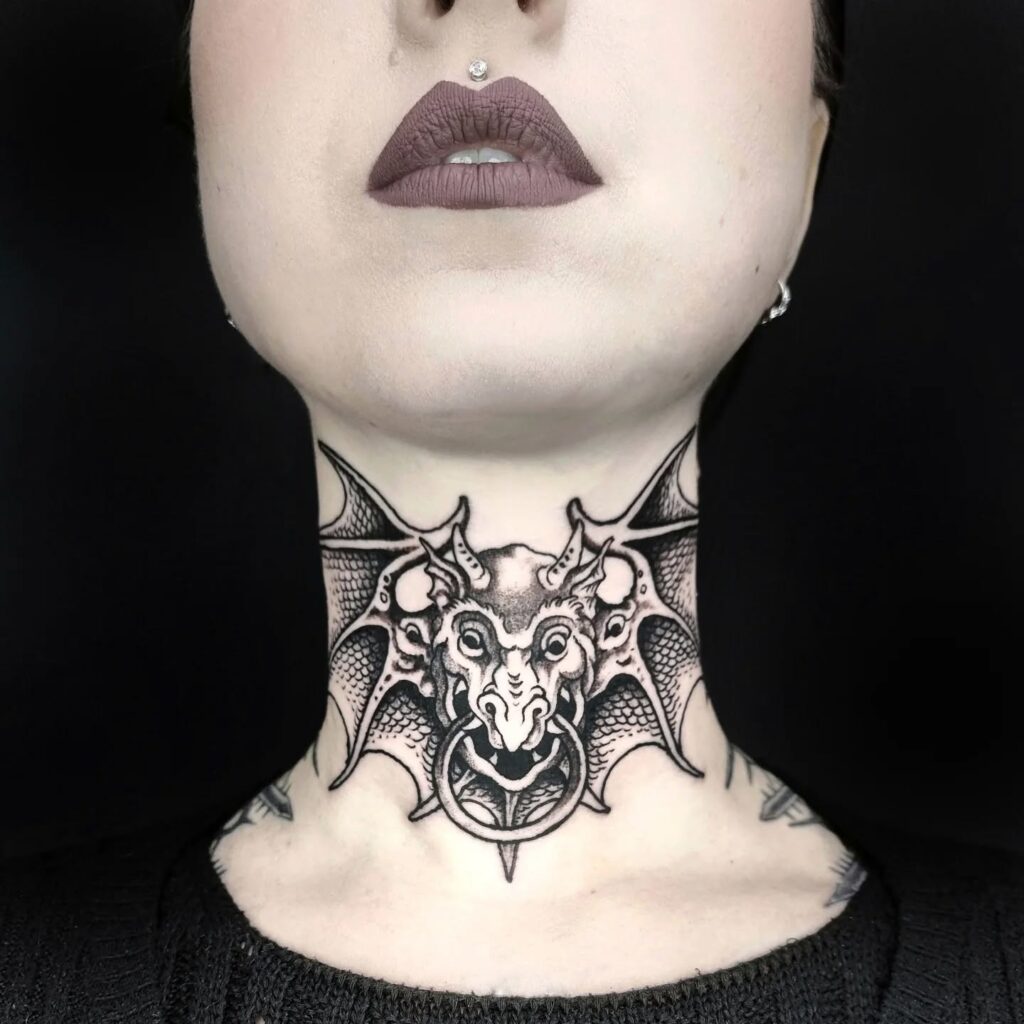 Black and Grey Gothic Gargoyle Neck Tattoo Bold and Intricate Design