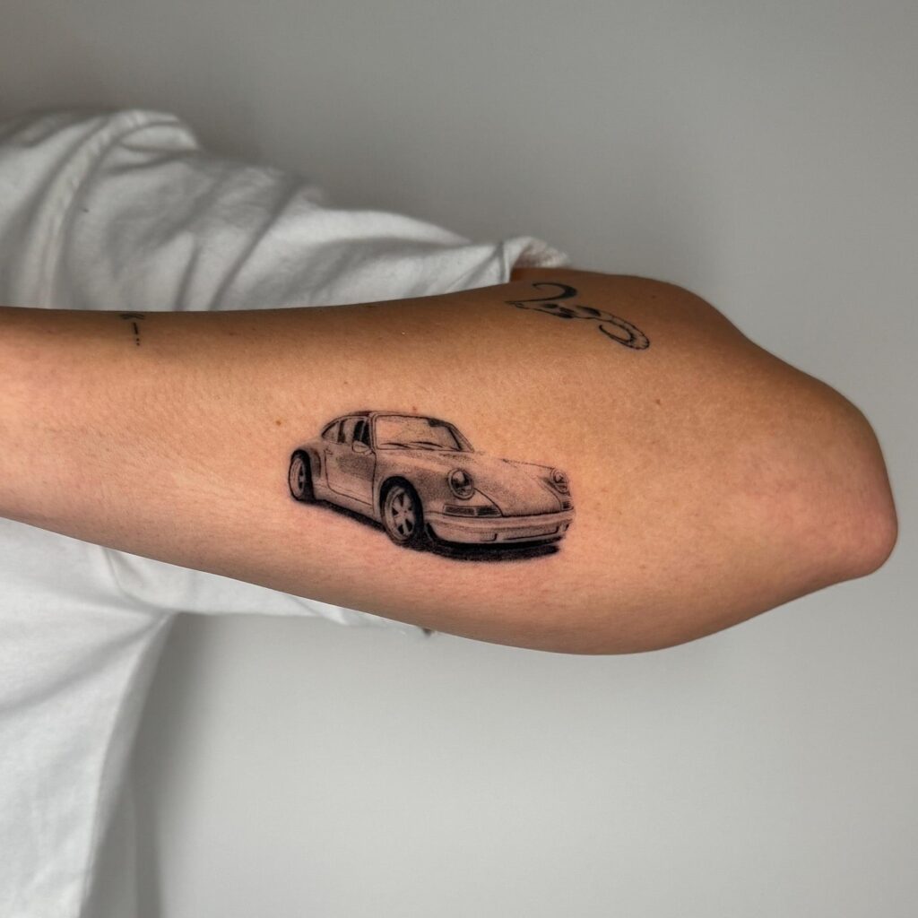 Black and Grey Porsche 911 Tattoo on Back of Forearm – Car Tattoo Ideas