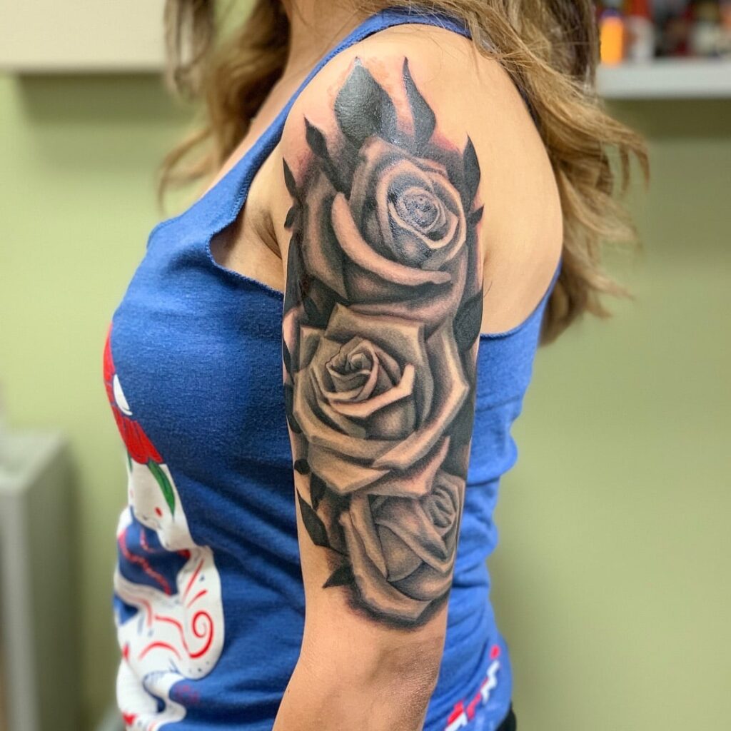 Black and Grey Roses: A Timeless Half Sleeve Tattoo Choice for Women