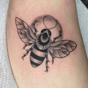 Black and white bee tattoo 1