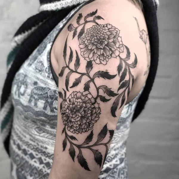 Black and white marigold tattoo 1