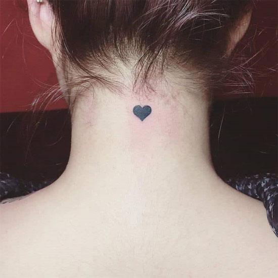 Black heart tattoo on neck