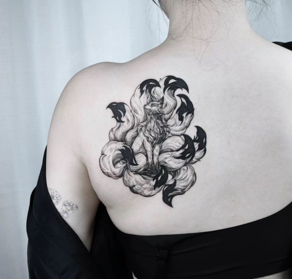 Black ninetailed fox behind the shoulder a dark and enigmatic guardian