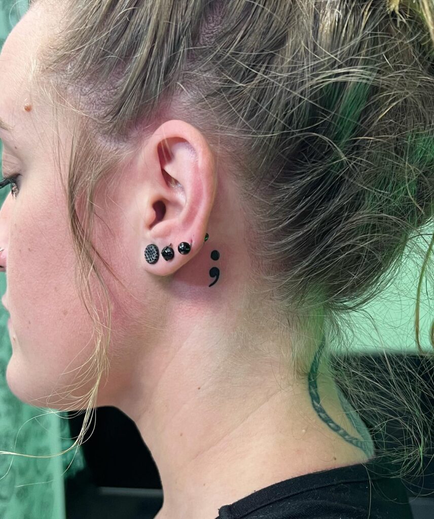 Black Semicolon Behind the Ear: Behind the Ear Elegance