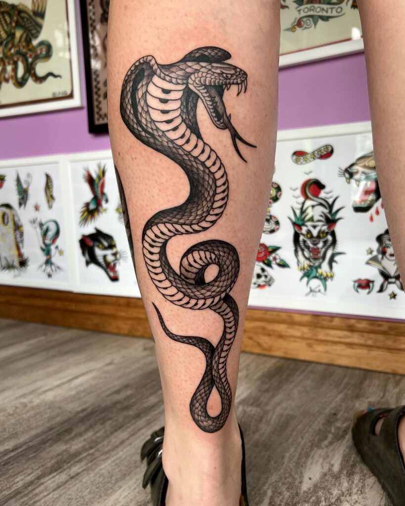 Black Work Angry Cobra Tattoo, Head Up with a Twisting Tongue: Calf Chronicles