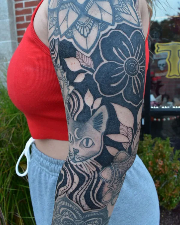 Blackwork Negative Space Tattoo 1