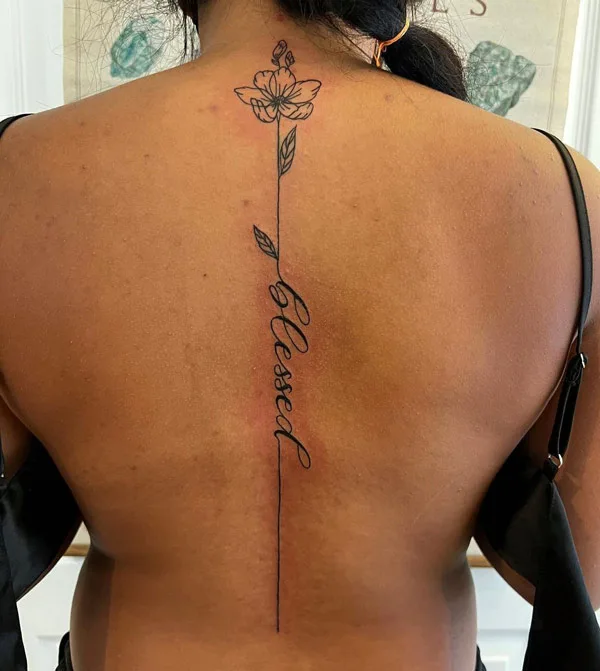 Blessed Spine tattoo