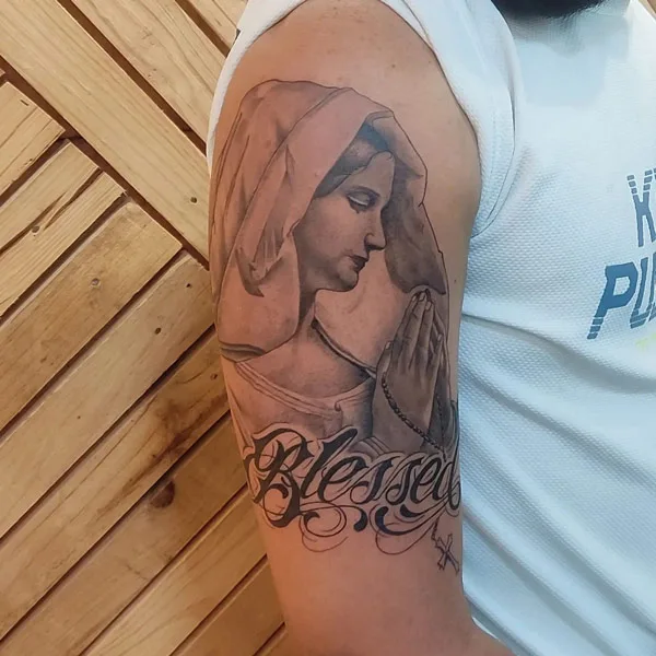 Blessed tattoo on arm 2