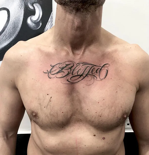 Blessed tattoo on chest 1