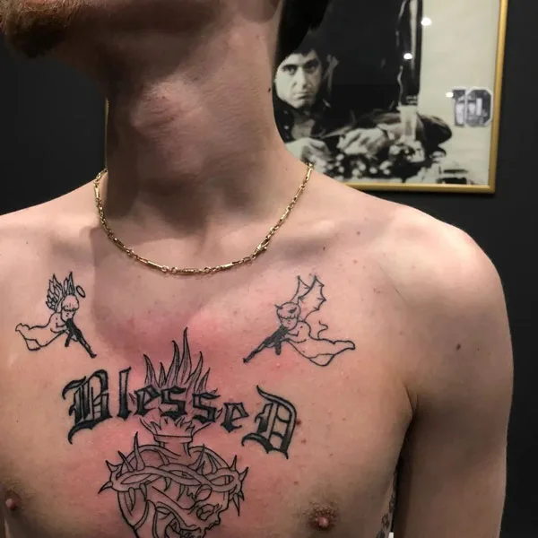 Blessed tattoo on chest 2