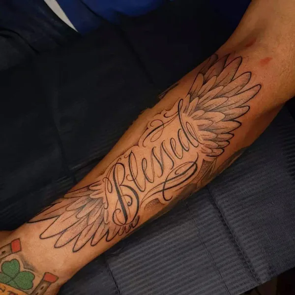 Blessed with angel wings tattoo
