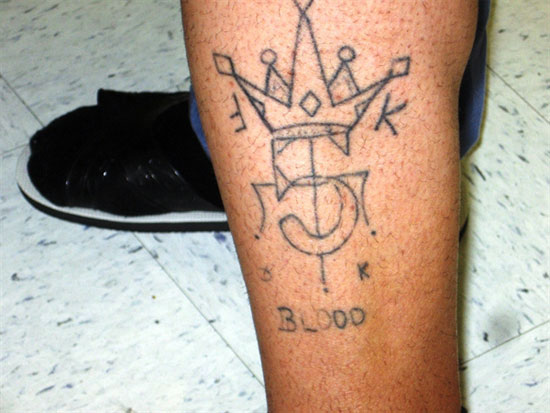 Blood gang leg tattoo