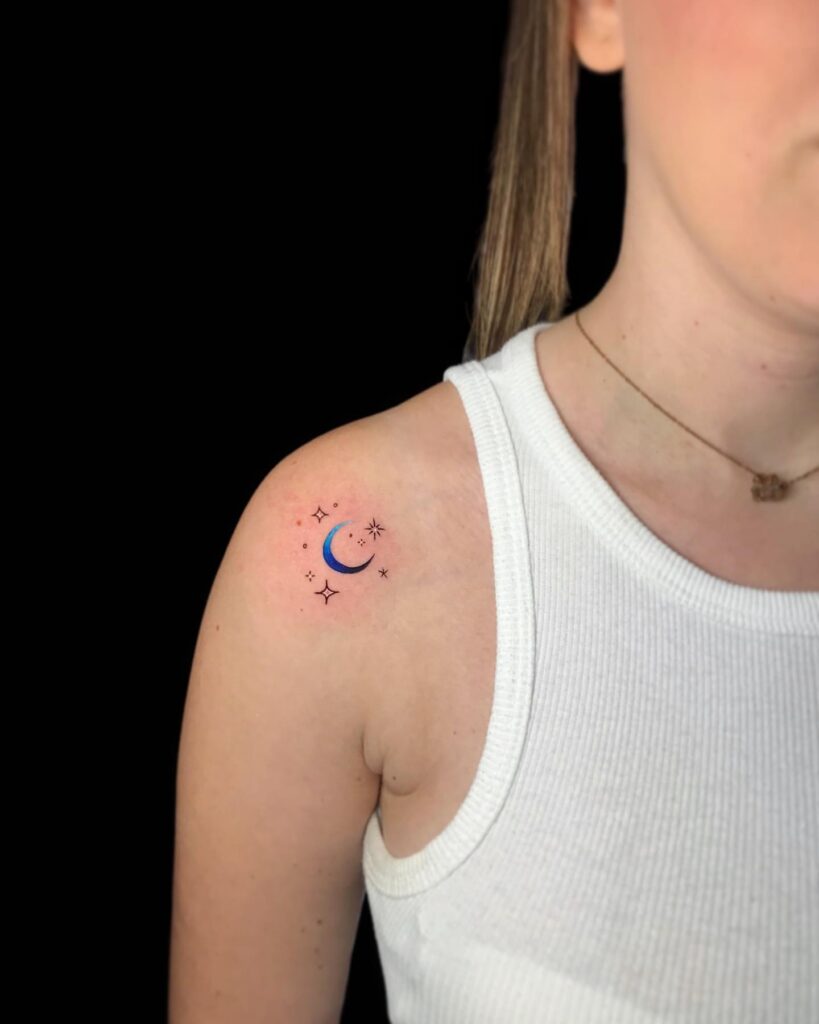 Blue moonlight moon and star tattoo ideas for the female shoulder