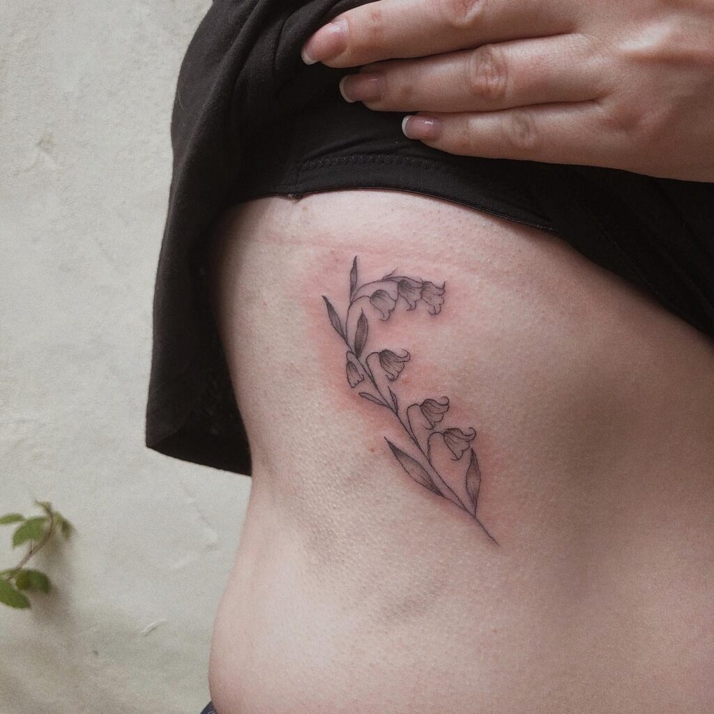 Bluebell Flower Tattoo on the Rib for Females: Ribbons of Beauty