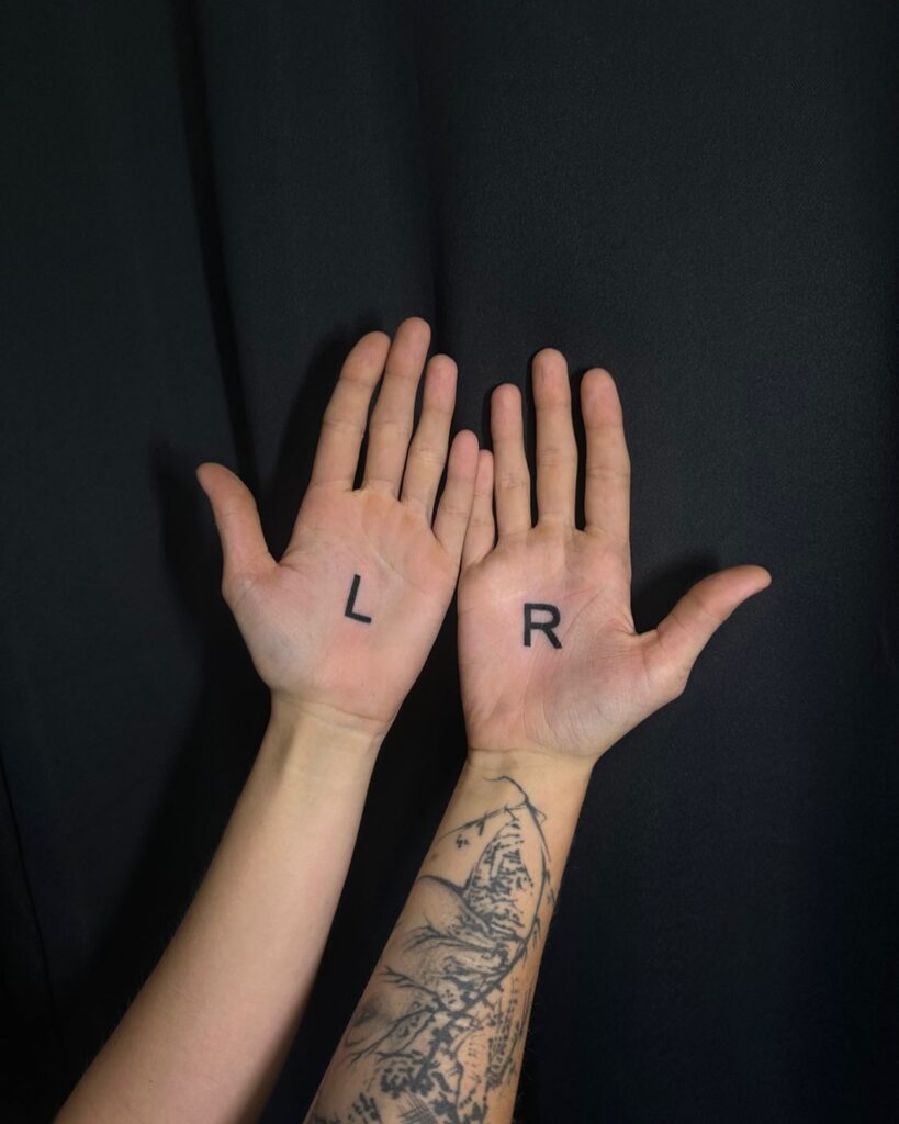 Bold L and R Letters on the Palms (Left and Right) Making a Stylish and Symmetric Statement: Palm Duo