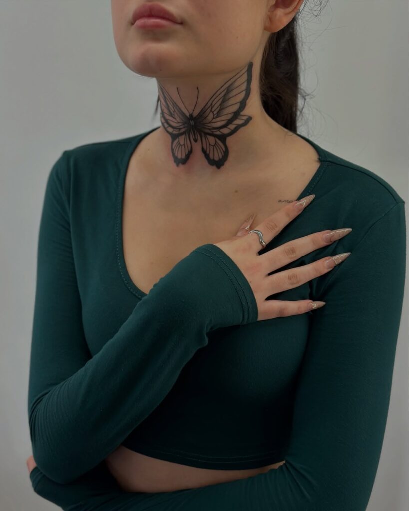 Bold Butterfly Neck Tattoo Detailed Symmetrical and Visually Striking