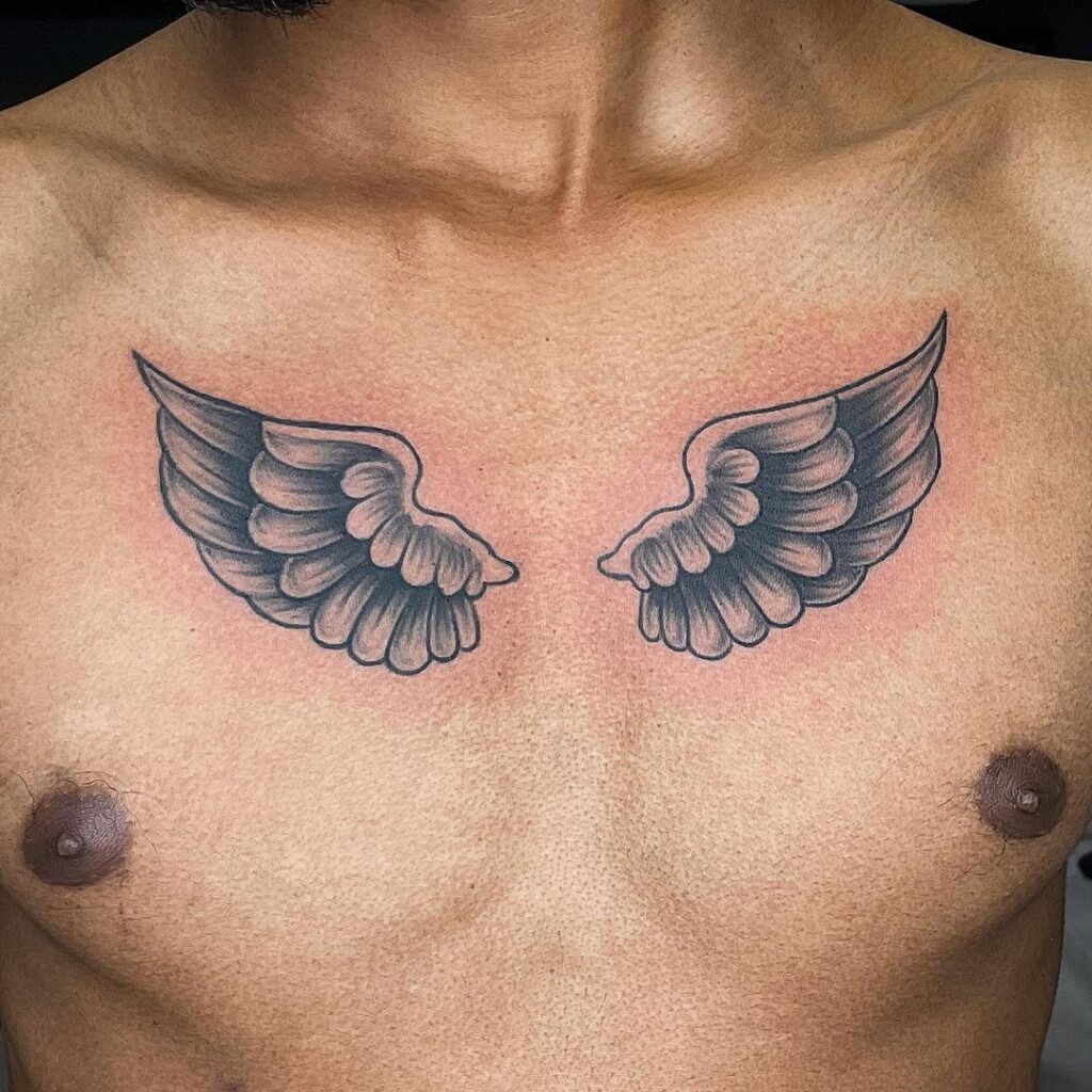 Bold & symbolic wings tattoo on the chest