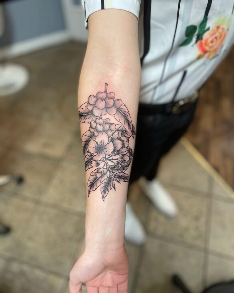 Botanical Coffee Plant Tattoo on Hand Capturing Natures Essence