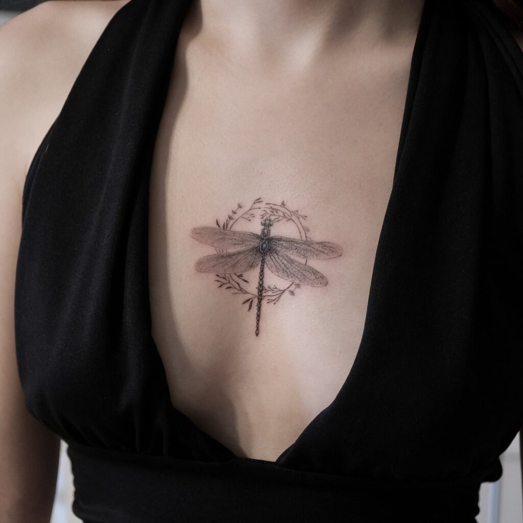 Botanical Wreath Dragonfly Tattoo with Elegant Chest Placement