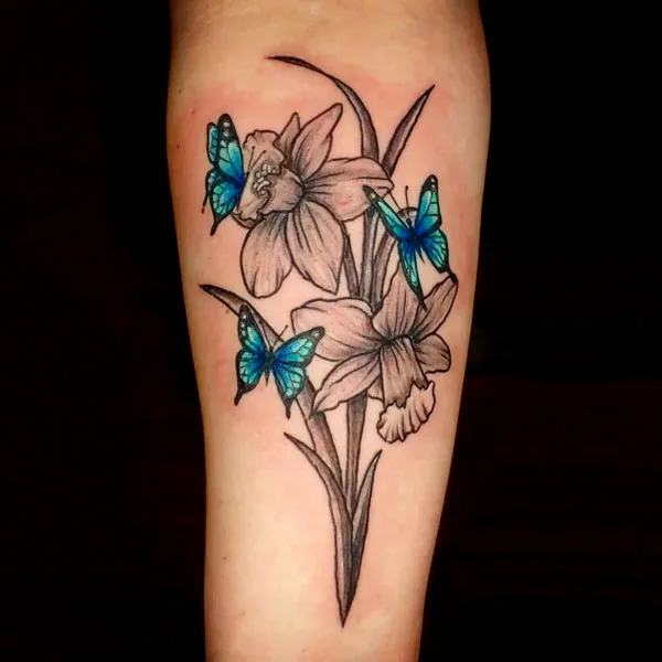 Butterfly December birth flower tattoo