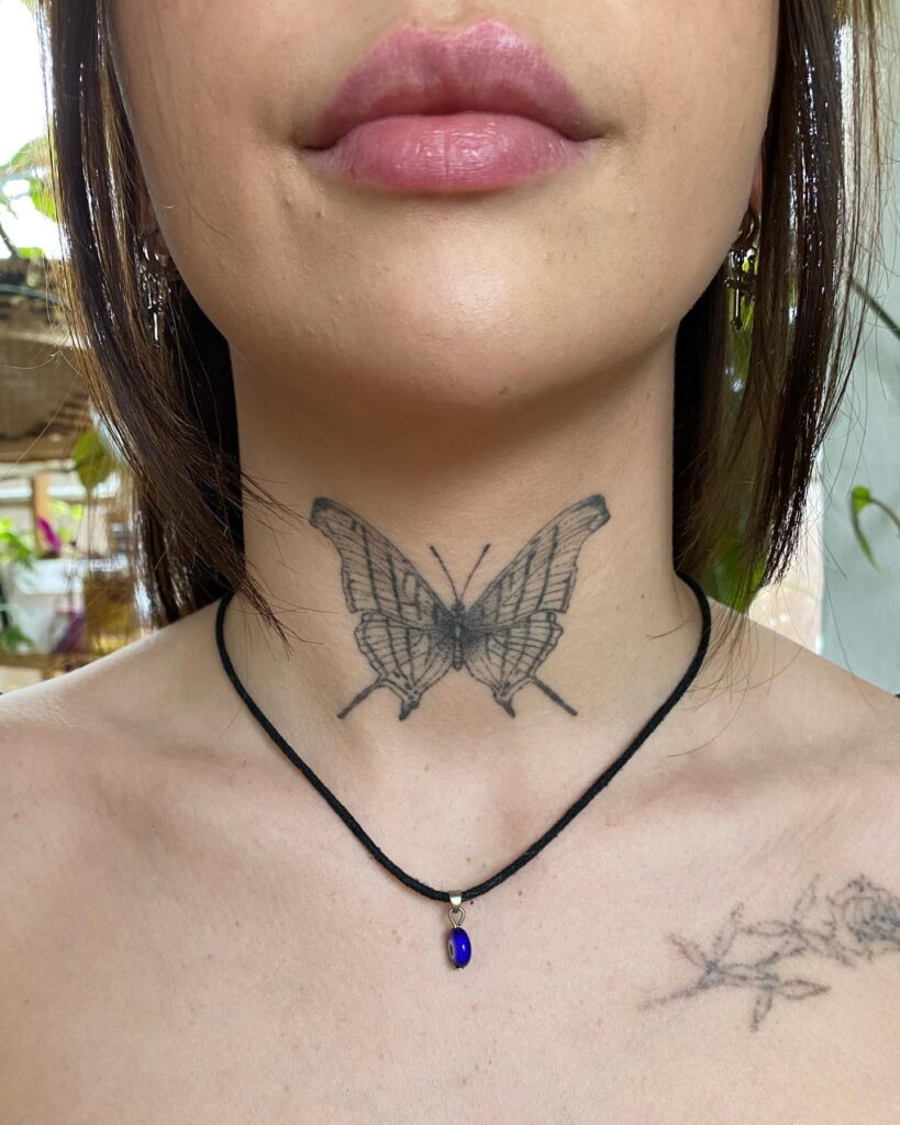 Butterfly dreams swallowtail butterfly tattoo on the front neck for women
