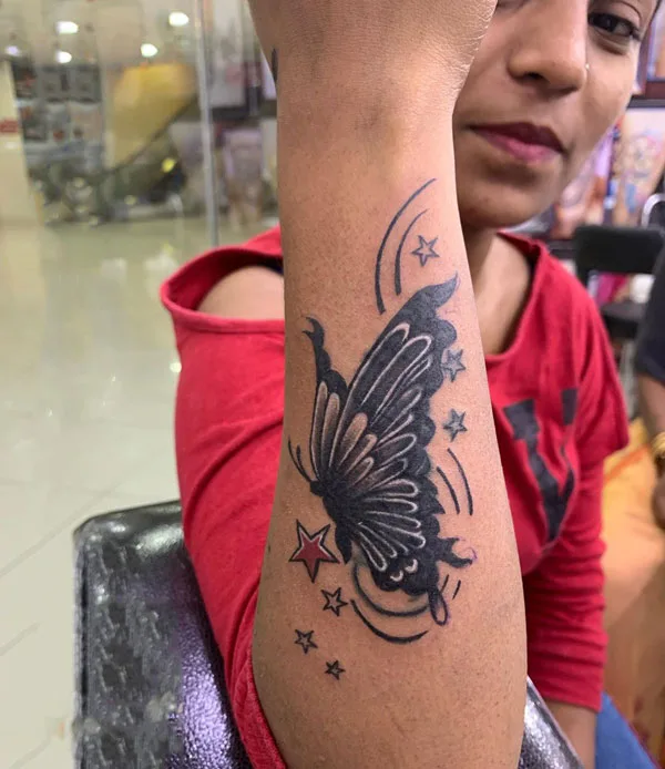 Butterfly hand tattoo 11