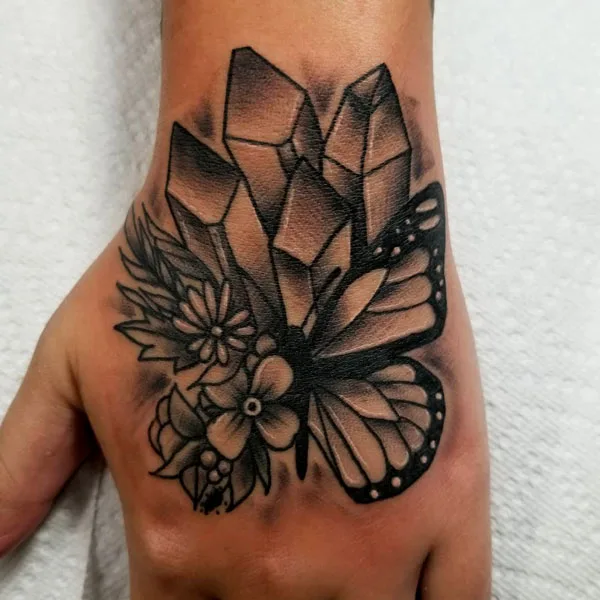 Butterfly hand tattoo 14
