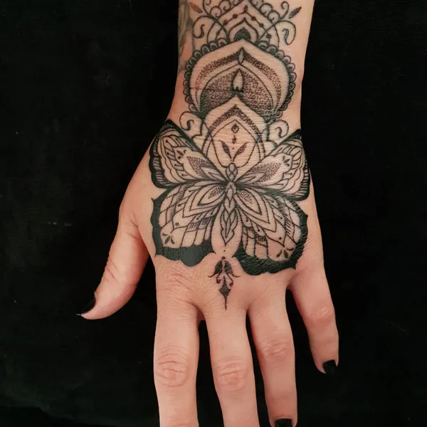 Butterfly hand tattoo 2