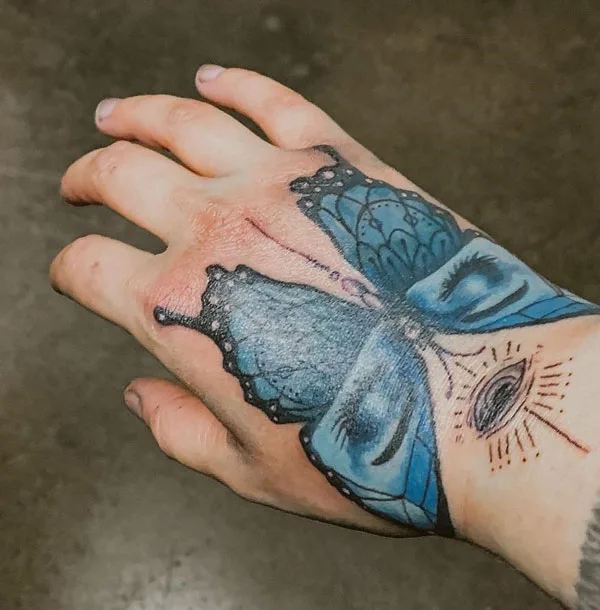 Butterfly hand tattoo 20