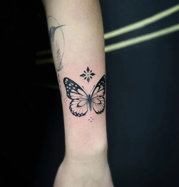 Butterfly hand tattoo 28