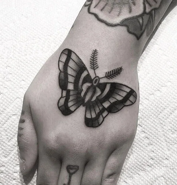 Butterfly hand tattoo 3