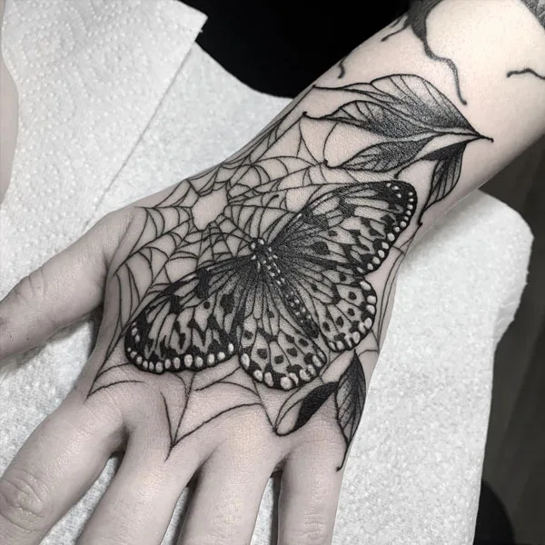 Butterfly hand tattoo 41