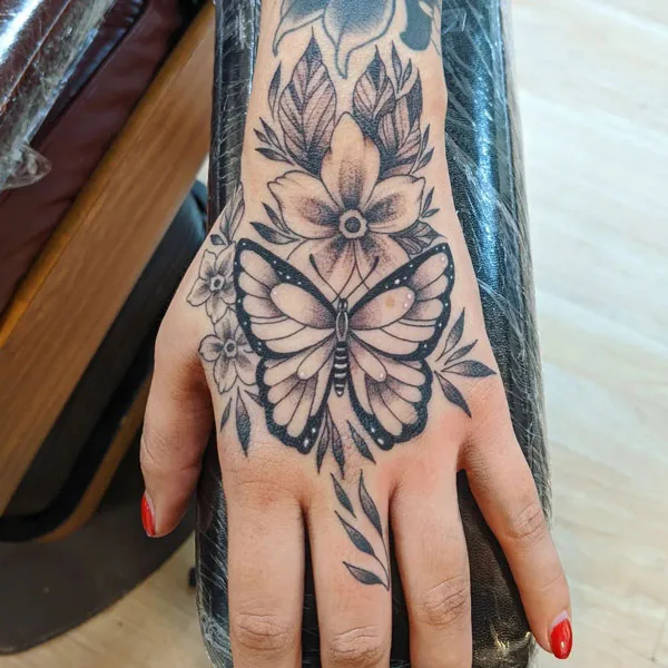 Butterfly hand tattoo 53