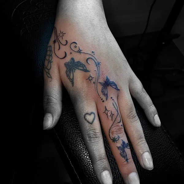 Butterfly hand tattoo 56